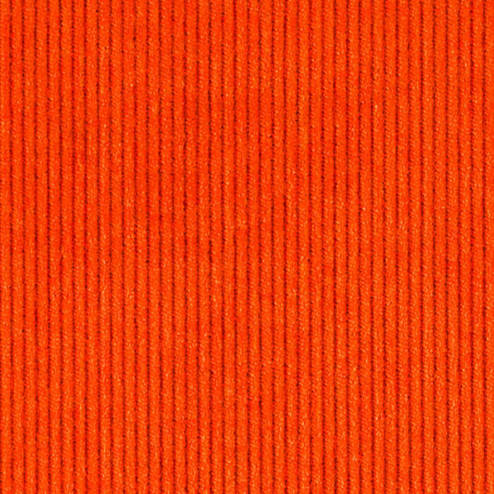 A close-up of bright orange corduroy fabric 