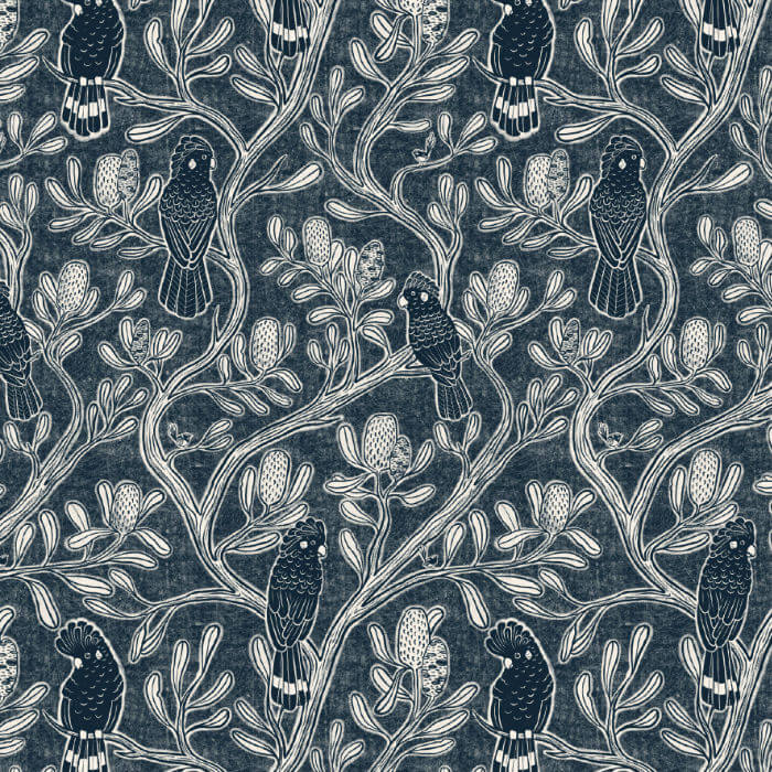 Patterned fabric with birds and branches on a dark blue background
