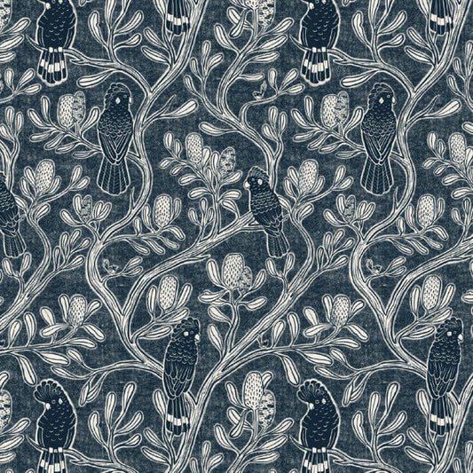 Patterned fabric with birds and branches on a dark blue background