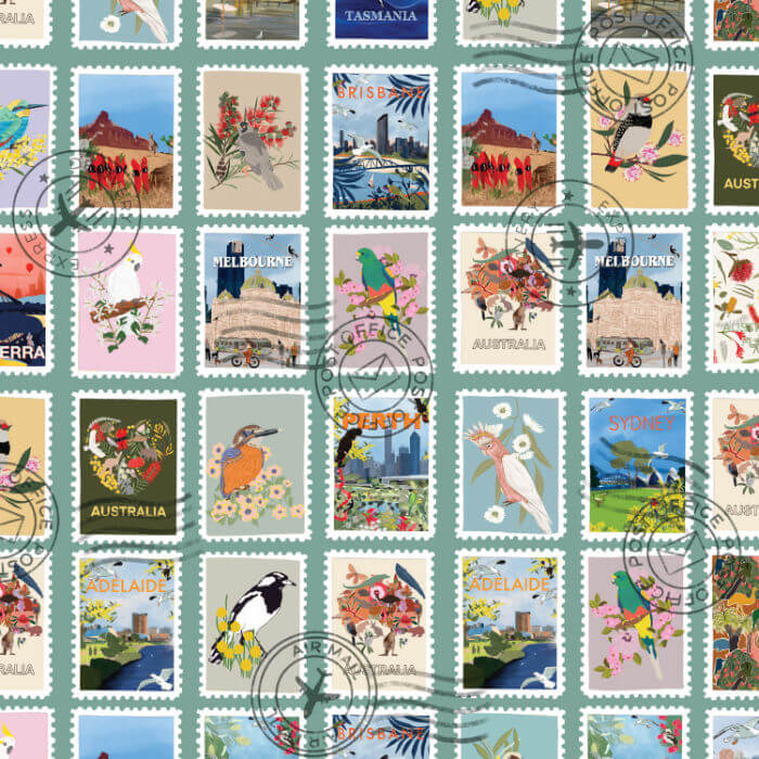 Australian postage stamp fabric with native birds, flowers and city scenes on a blue background.