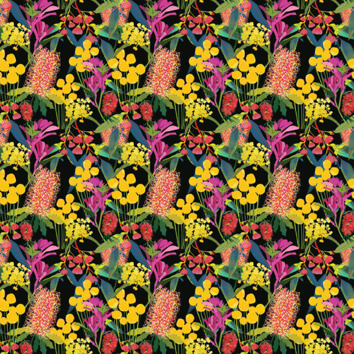 Black Australian native flower fabric with colourful bottlebrush, wattle, gum blossoms and foliage.
